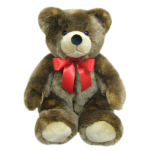 Fluffy brown teddy bear with tan muzzle wearing a red satin bow
